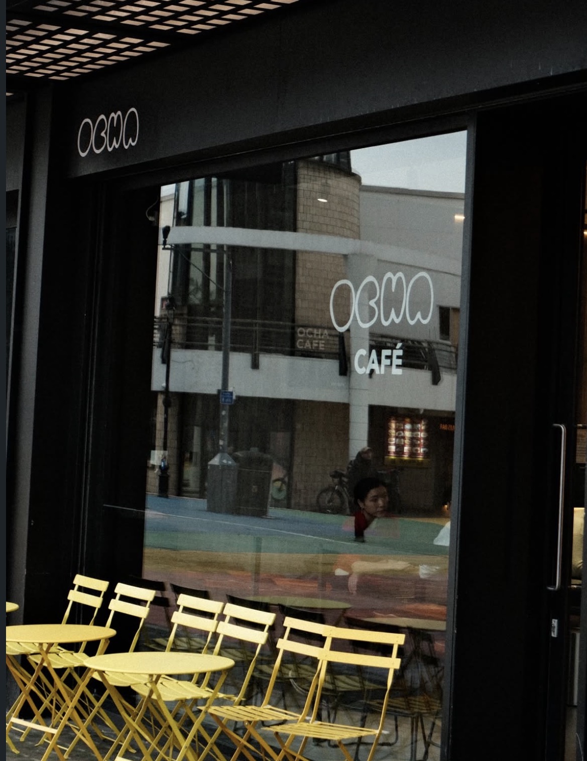 Ocha shopfront with yellow bistro chairs